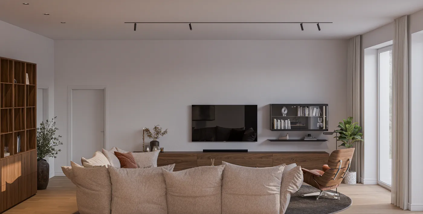 Wohnbereich der Hanglagenwohnung mit Sofalandschaft und Medienwand.